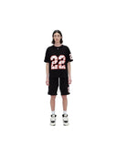 Amiri 22 Football Print Oversized Shorts one-kickz
