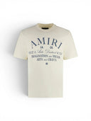 Amiri Arts District Tee In Cream Vanilla Ice one-kickz