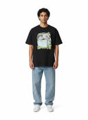 One Kickz camiseta negra de manga corta con estampado de volcán y palmeras, estilo playero.