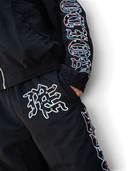 Mixed Emotions "ME" rhinestone Nylon Pants