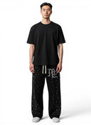 Mixed Emotions Pearl Flare Sweatpants Black one-kickz