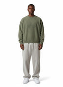 One Kickz Supreme Overdyed Raised Sweater Olive - jersey de punto con relieve "NYC SUPREME" en color verde oliva.