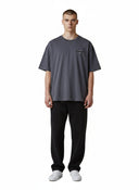 Camiseta gris marengo de corte extragrande de Allsaints con logo bordado en el pecho y cuello redondo.