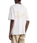Camiseta blanca de algodón AMIRI Sport 94 con estampado trasero en One Kickz