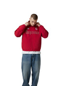 Chaqueta deportiva roja Supreme Umbro con detalles de pedrería, usada por un modelo sobre fondo blanco en One Kickz.
