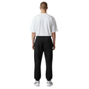 Vista trasera de pantalones de chándal Corteiz Alcatraz Triple Black de One Kickz con bolsillo trasero