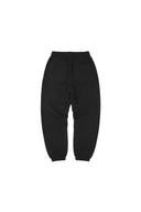 Pantalones de chándal Corteiz Alcatraz Triple Black de One Kickz en color negro con ajuste holgado y puños elásticos.